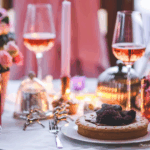 Hospitality etiquette | beautiful dinner table in hues of pink, ivory, gold, and red